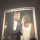 Drake performs at the 2015 OVO Fest in front of a jumbo screen with an altered photo featuring the faces of Nicki Minaj and Meek Mill.
Screenshot